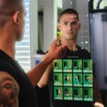 rapaz treinando com máquina de resistência eletromagnética no TTC Studio Copacabana